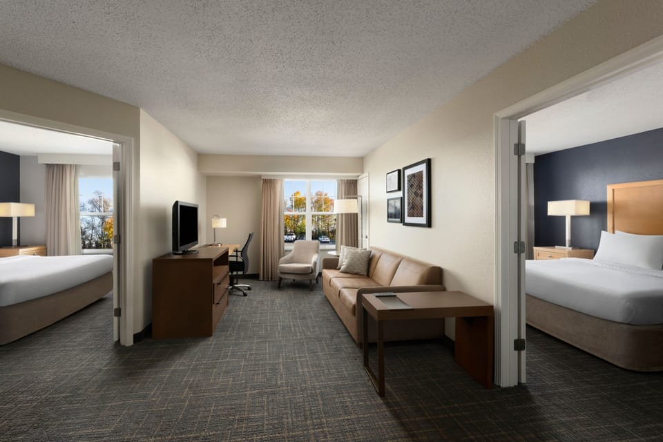 Suite, 2 Bedrooms | Living area | 27-inch Smart TV with satellite channels, TV, Netflix