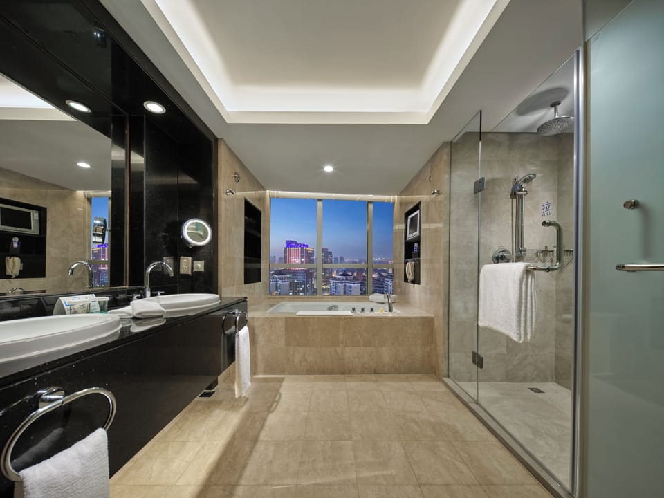 Separate tub and shower, deep soaking tub, rainfall showerhead