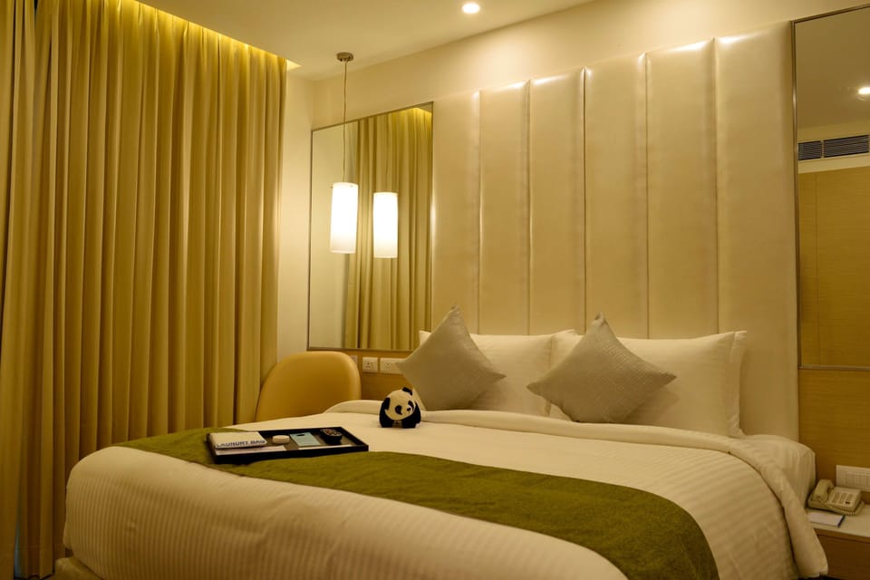 Hypo-allergenic bedding, down comforters, memory foam beds, minibar