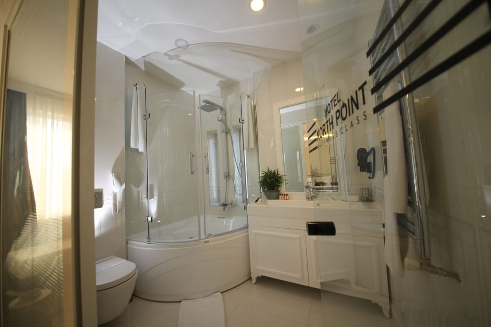 Suite | Bathroom | Hair dryer, bathrobes, slippers, towels