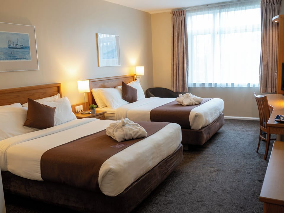 Twin Room, 2 Queen Beds | In-room safe, desk, iron/ironing board, free cribs/infant beds