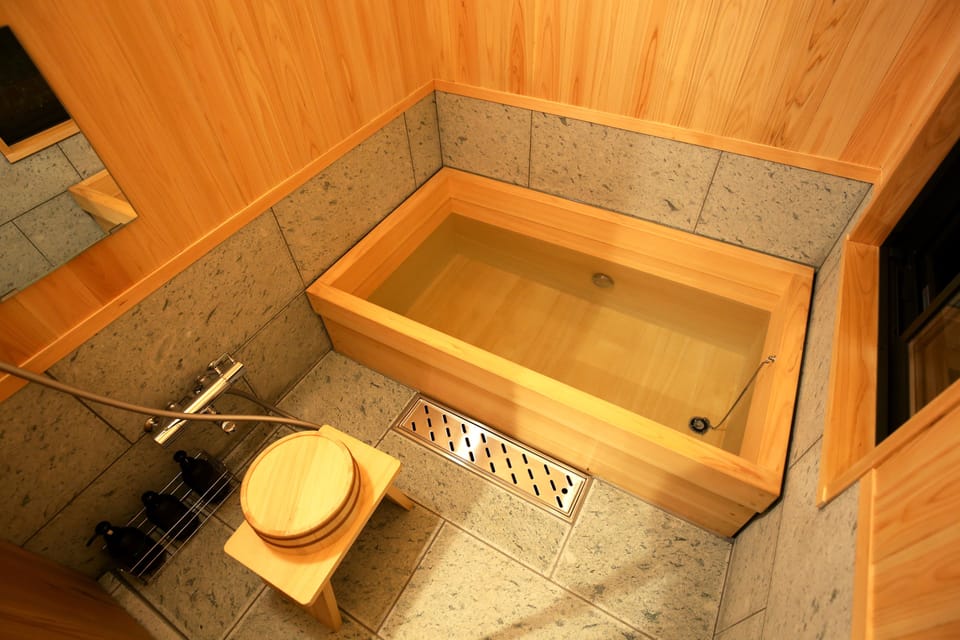 Japanese Style Townhouse (Beds + Futons) | Bathroom | Separate tub and shower, free toiletries, hair dryer, slippers