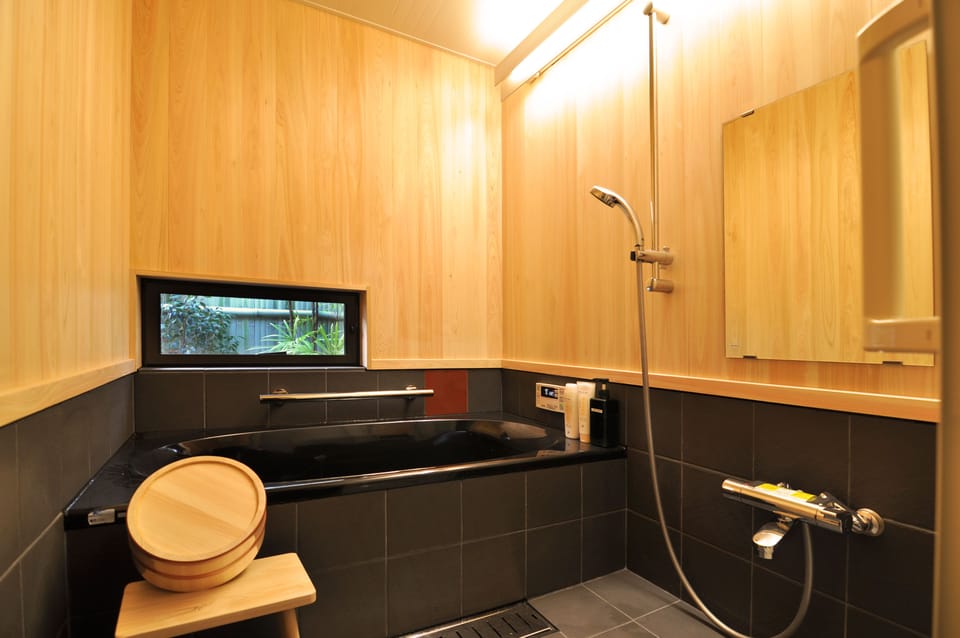 Japanese Style Townhouse (Beds + Futons) | Bathroom | Separate tub and shower, deep soaking tub, free toiletries, hair dryer