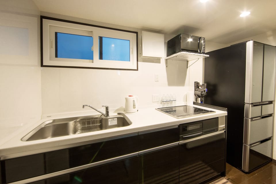 Japanese Style Townhouse | Private kitchen | Fridge, microwave, stovetop, espresso maker