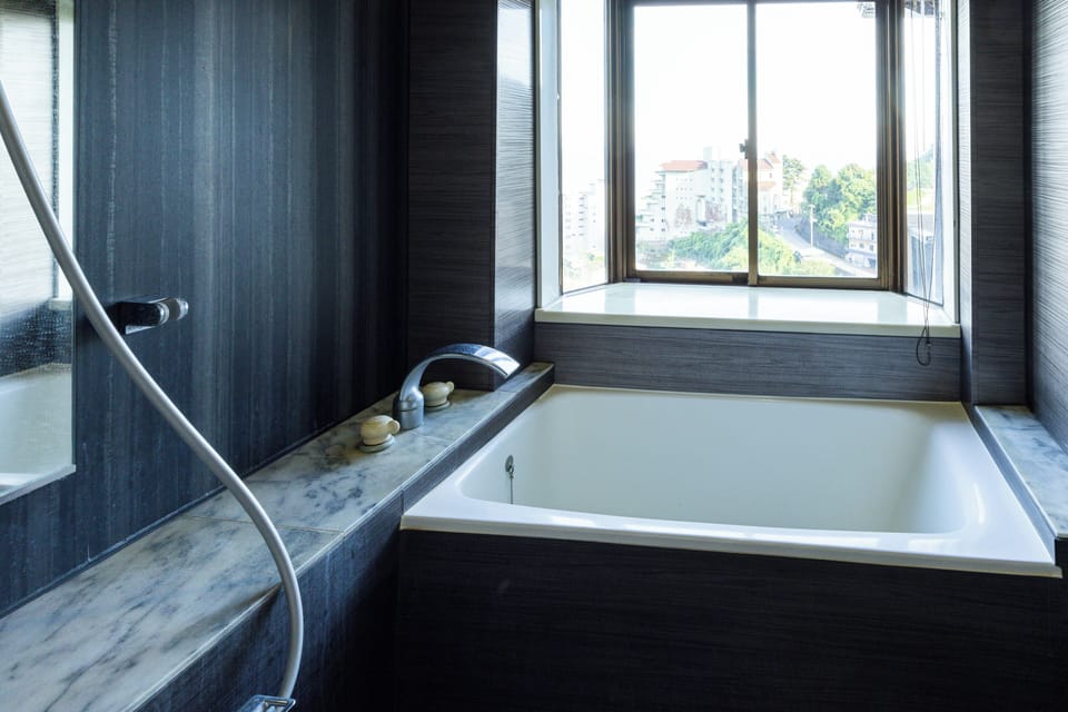Superior Twin Room, Private Bathroom, Ocean View | Bathroom | Hair dryer, slippers, electronic bidet, soap