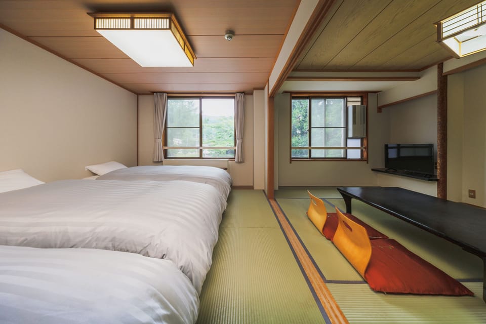Superior Triple Room, Mountain View | In-room safe, bed sheets
