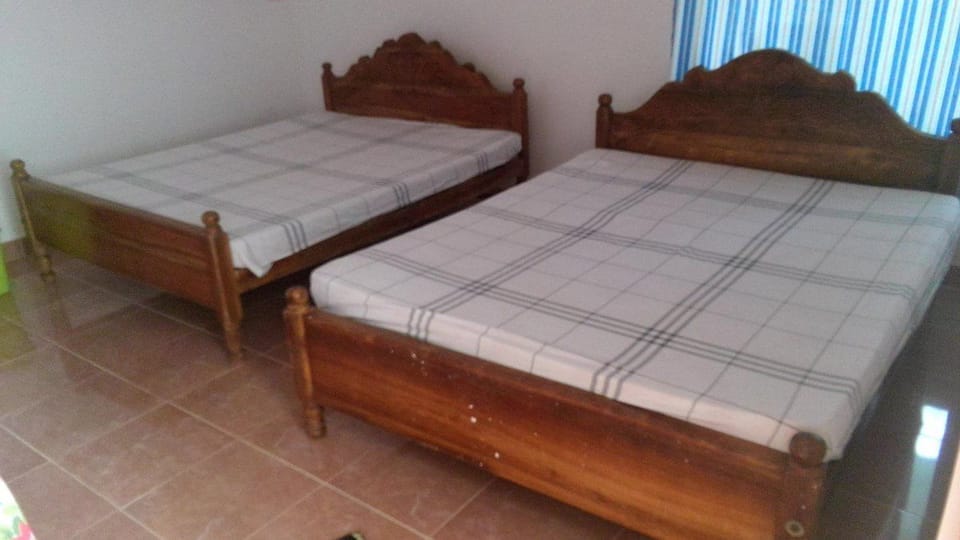 Basic Quadruple Room, 2 Double Beds, Lake View | Premium bedding, desk, iron/ironing board, free WiFi