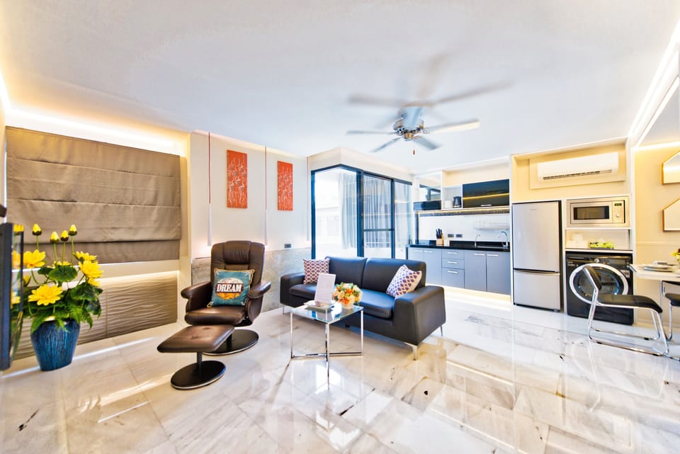 Exclusive Apartment, 3 Bedrooms | Living area | Flat-screen TV, Netflix, DVD player