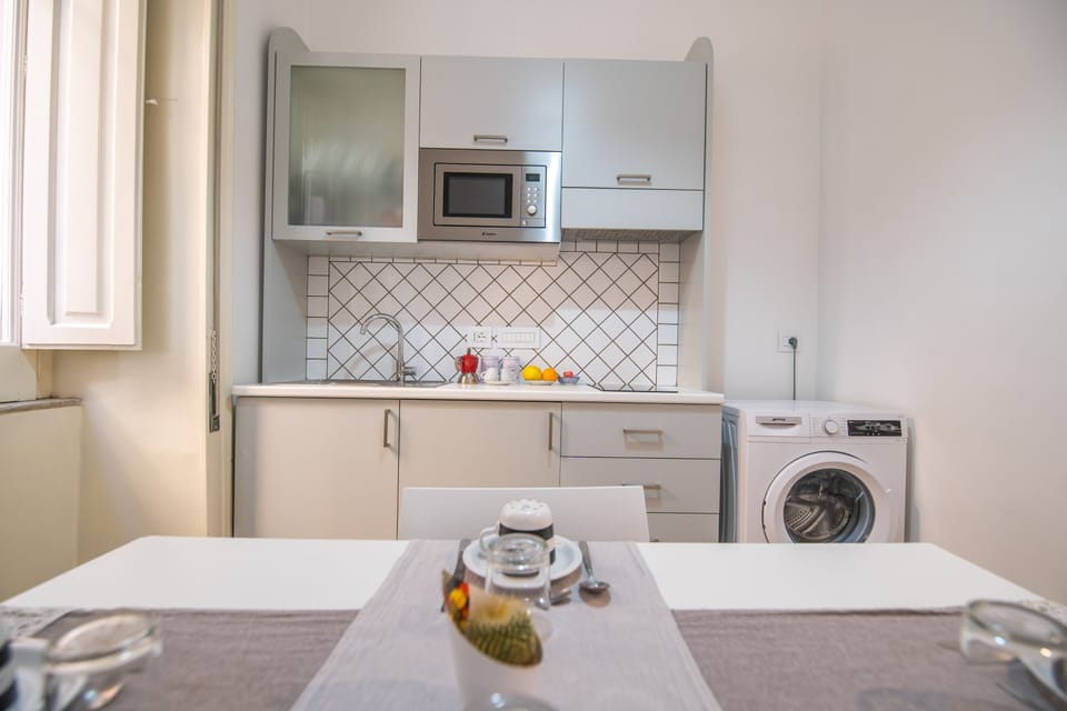 Classic Room, 1 Bedroom, Non Smoking, City View | Private kitchen | Fridge, dining tables