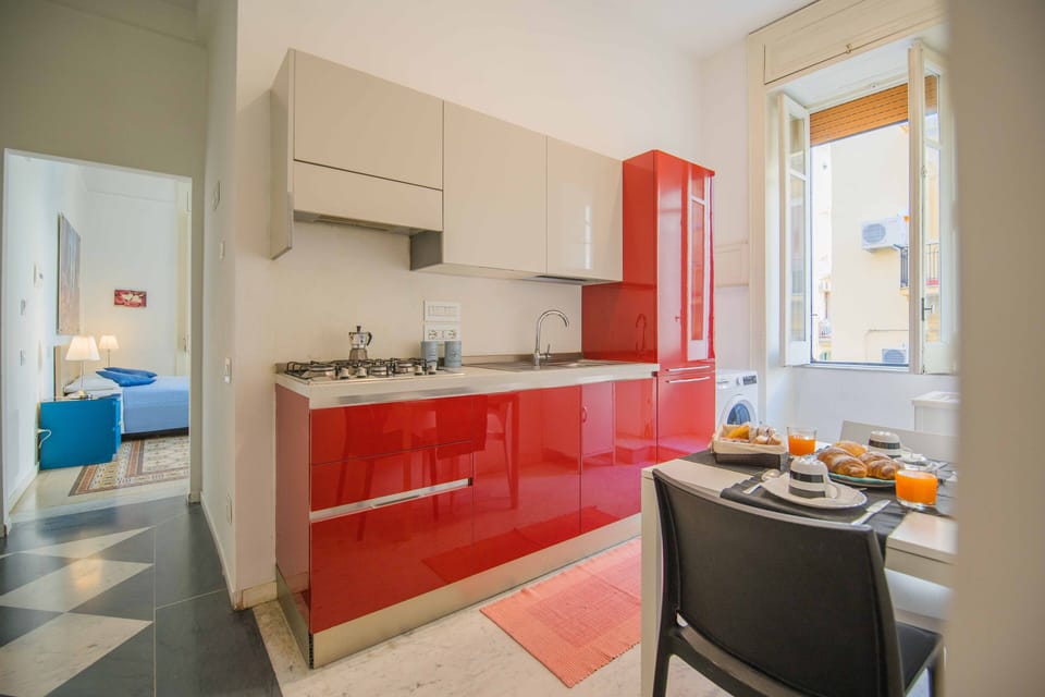 Deluxe Room, Balcony | Private kitchen | Fridge, dining tables