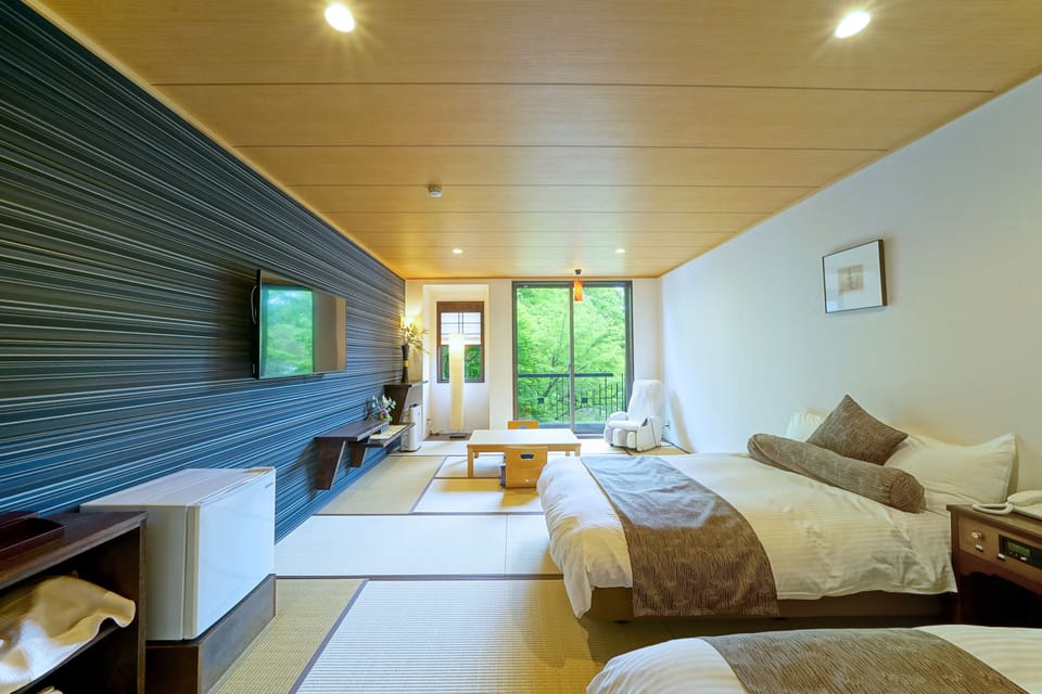 Traditional Twin Room, Non Smoking | Minibar, in-room safe, desk, free WiFi