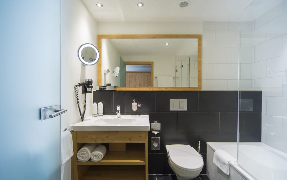 Separate tub and shower, hair dryer, towels