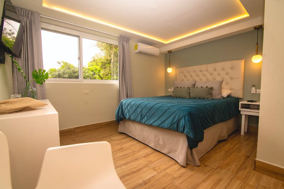 Deluxe Room, 1 Queen Bed | In-room safe, desk, iron/ironing board, free WiFi