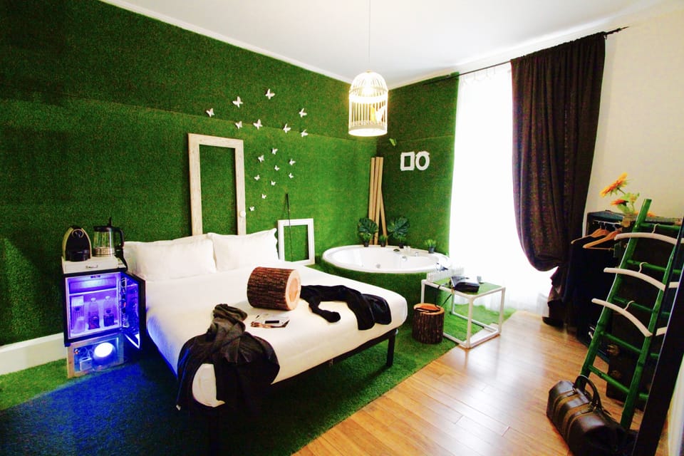 Romantic Double Room, Jetted Tub | Down comforters, minibar, in-room safe, individually decorated