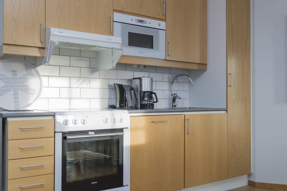 Apartment, 2 Bedrooms | Private kitchen | Fridge, microwave, oven, stovetop