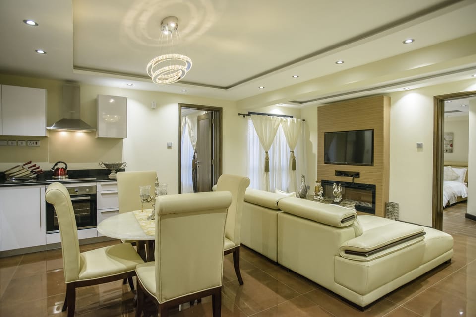 Superior Suite | Living area | Flat-screen TV