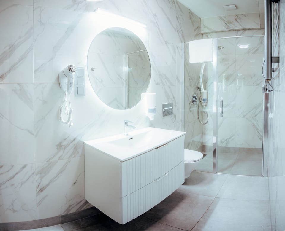 Hair dryer, towels, soap, shampoo