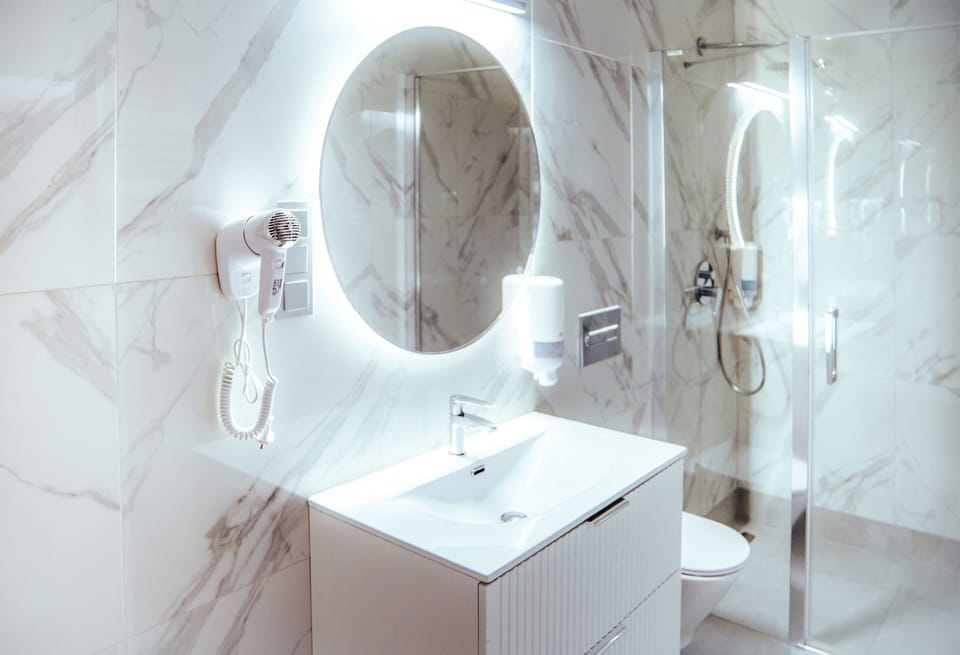 Hair dryer, towels, soap, shampoo