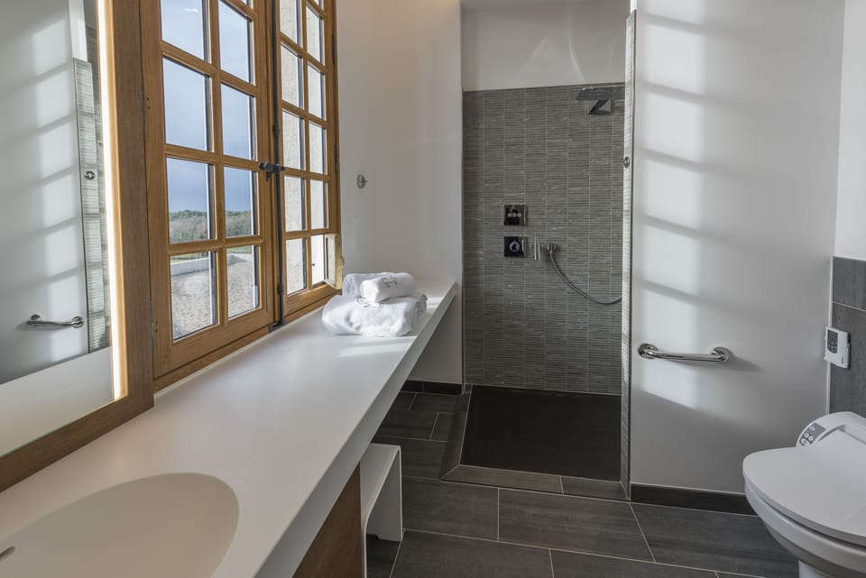 Shower, free toiletries, hair dryer, bathrobes