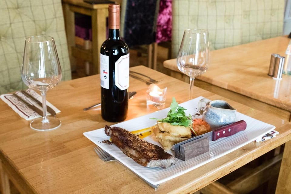 Breakfast, lunch, dinner served; local cuisine 