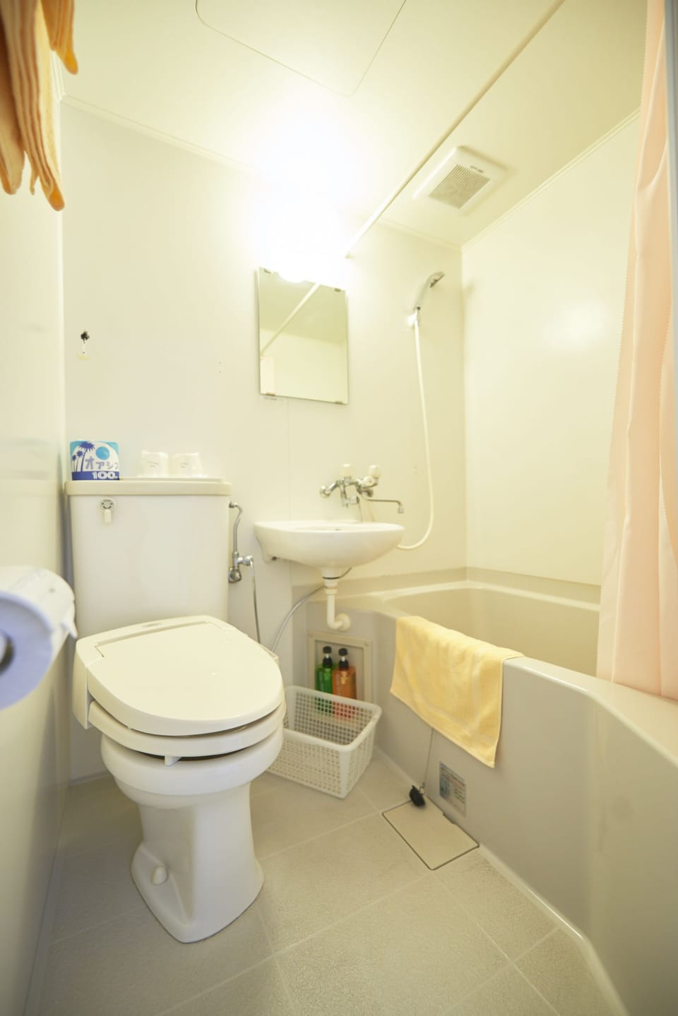 Combined shower/tub, free toiletries, hair dryer, slippers