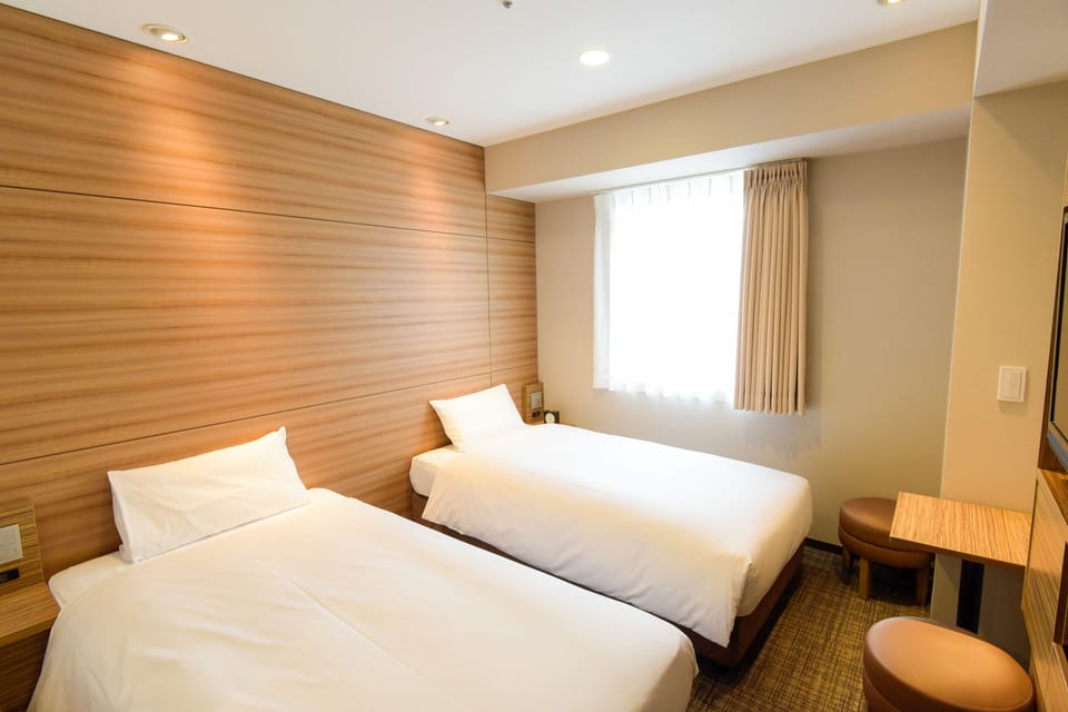 Down comforters, blackout drapes, iron/ironing board, free WiFi