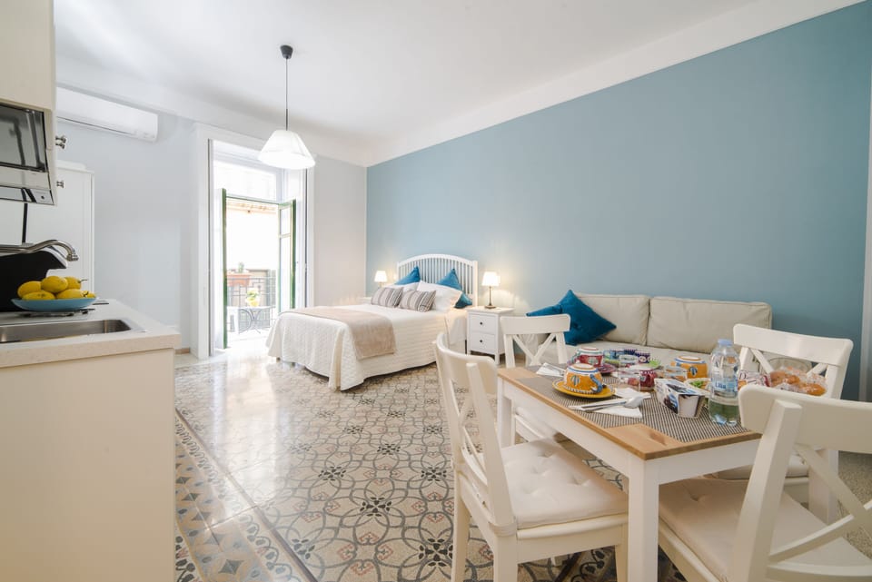 Deluxe Studio, City View | Blackout drapes, soundproofing, free WiFi, bed sheets