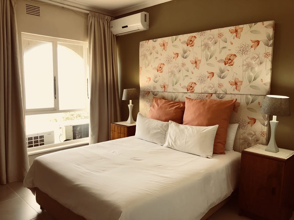 Deluxe Room | Premium bedding, blackout drapes, iron/ironing board, WiFi