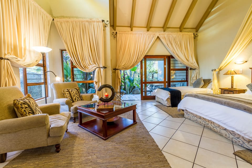 Exclusive Studio Suite, Multiple Beds, Hot Tub, Garden View | Living area | TV