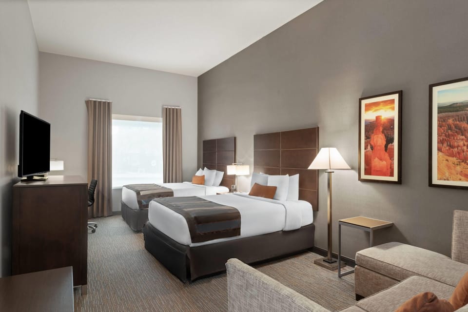 Room, Multiple Beds, Non Smoking | In-room safe, desk, iron/ironing board, free cribs/infant beds