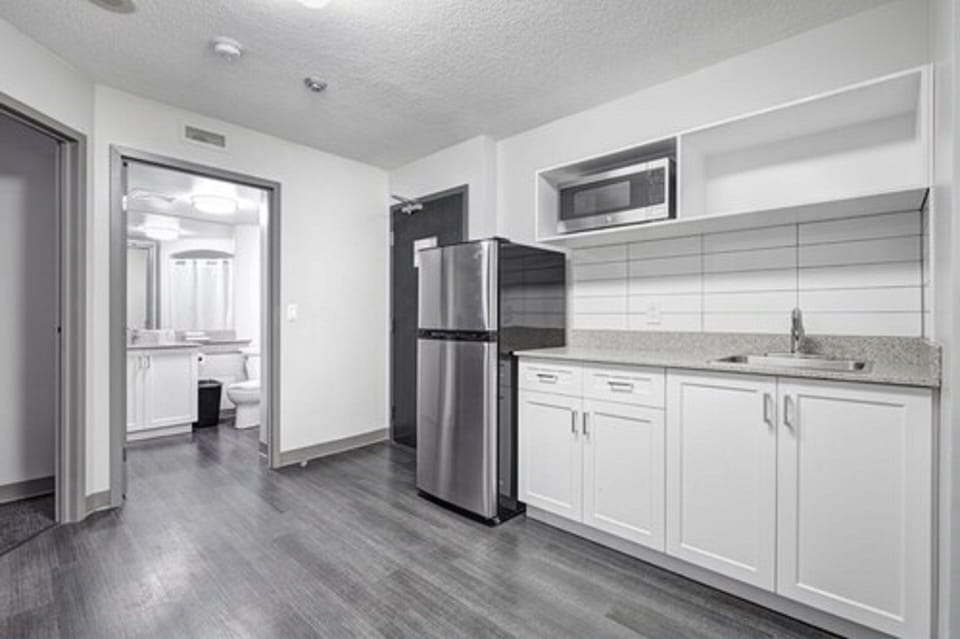 Suite, 2 Bedrooms, Kitchenette | Private kitchen | Full-size fridge, microwave