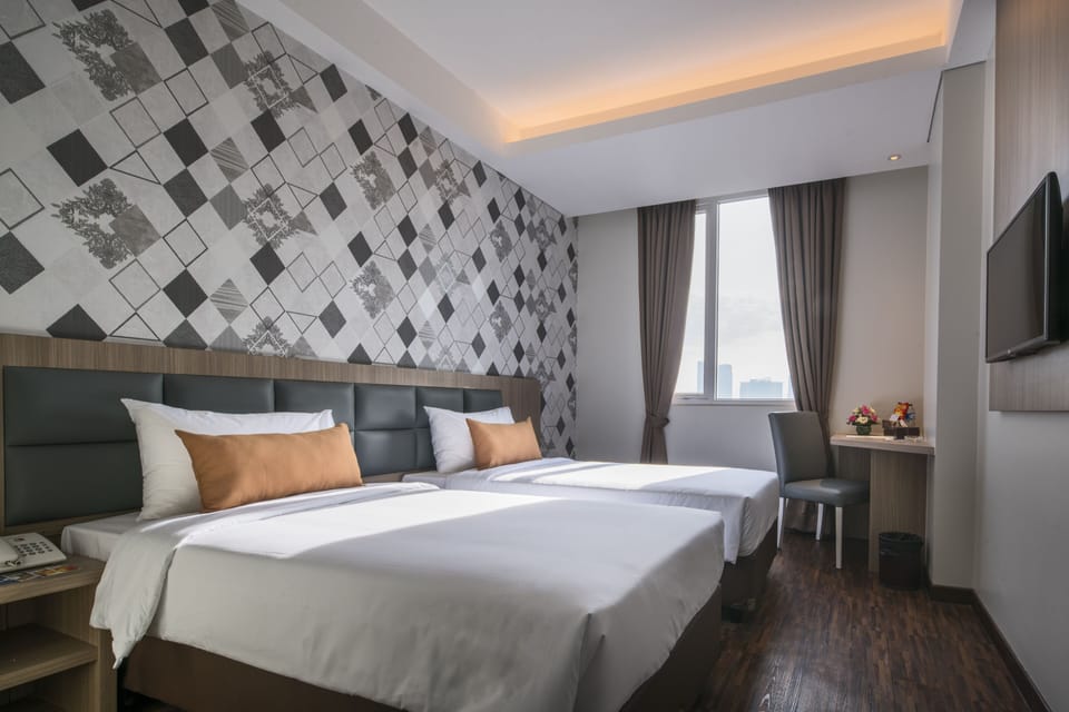 Executive Twin Room | In-room safe, desk, blackout drapes, iron/ironing board
