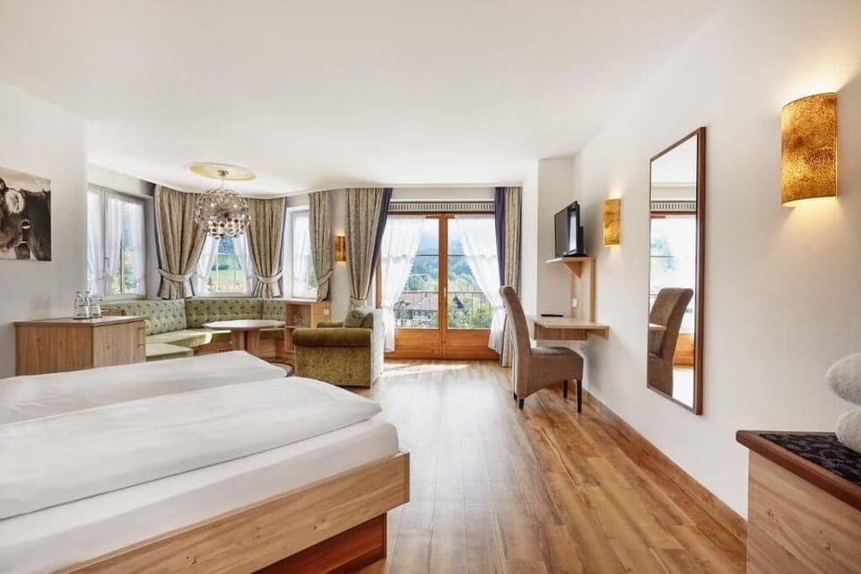 Deluxe Double Room, Mountain View | Hypo-allergenic bedding, minibar, in-room safe, individually decorated