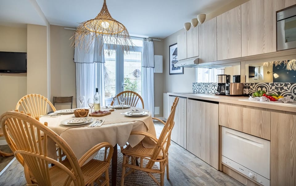 Apartment | Living area | 60-cm flat-screen TV with cable channels, TV