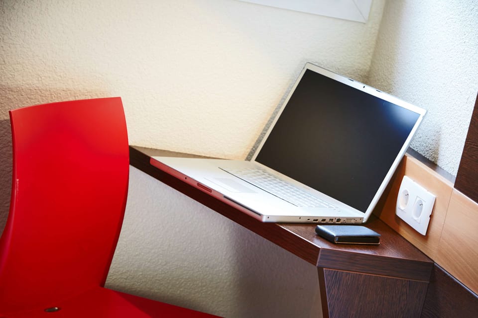 Desk, blackout drapes, soundproofing, free WiFi