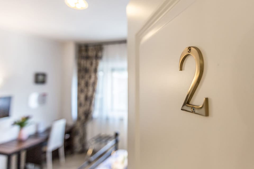 Triple Room, Private Bathroom (External) | Egyptian cotton sheets, premium bedding, down comforters, minibar