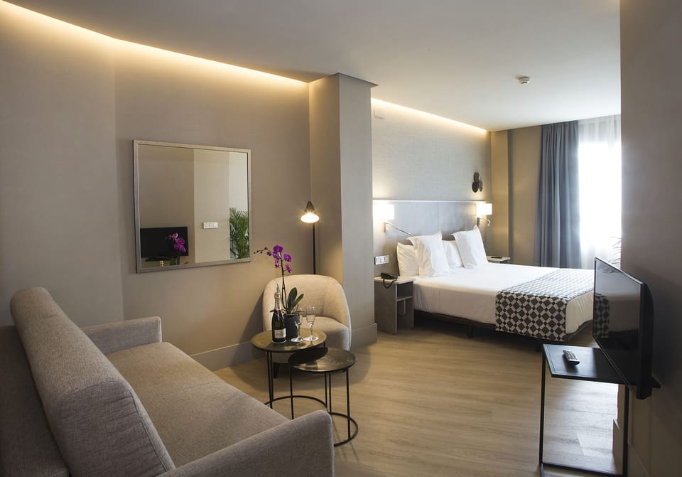 Premium bedding, down comforters, pillowtop beds, minibar