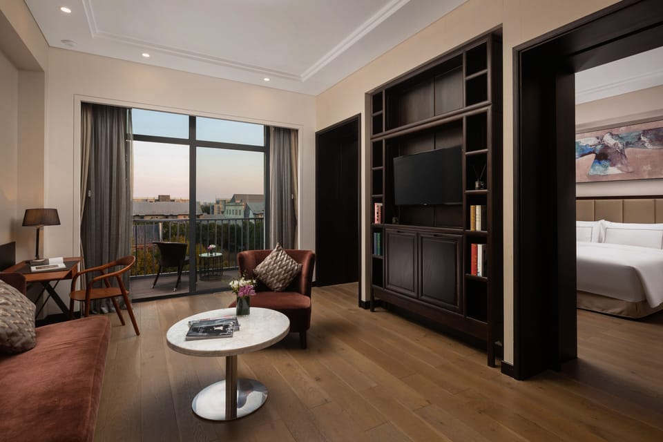 Premium bedding, down comforters, minibar, in-room safe
