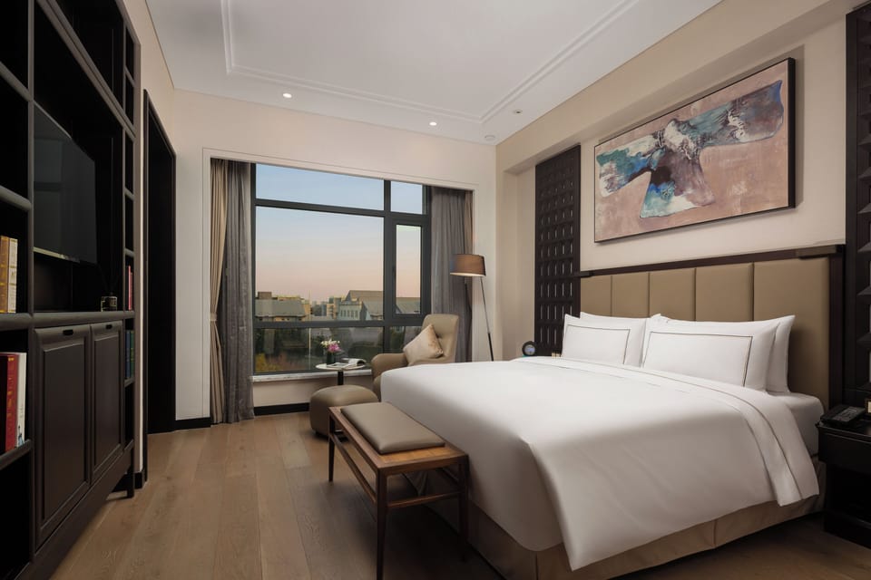 Premium bedding, down comforters, minibar, in-room safe