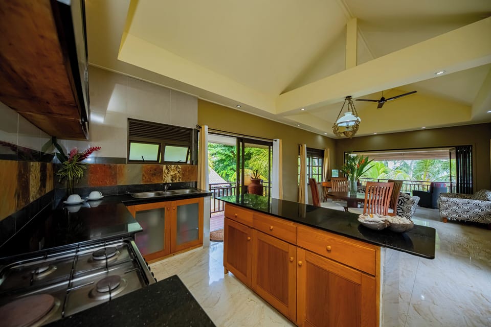 Apartment, 1 King Bed, Sea View, Beachfront | Private kitchen | Coffee/tea maker, fridge, microwave, electric kettle
