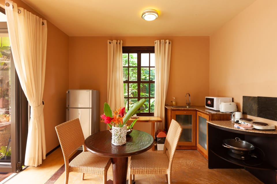 Suite, Kitchenette, Partial Sea View | In-room dining