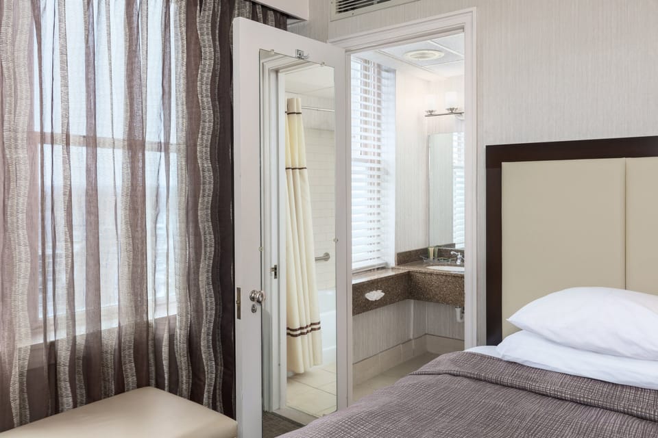 Standard Room, 2 Queen Beds, City View | Individually decorated, desk, blackout drapes, iron/ironing board