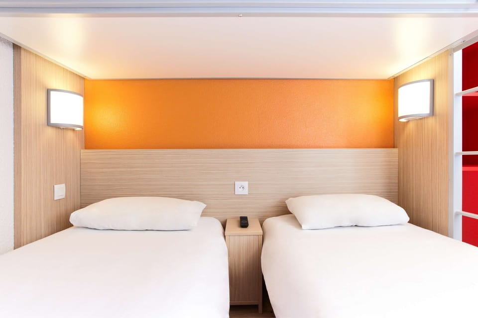 Desk, blackout drapes, soundproofing, free cribs/infant beds