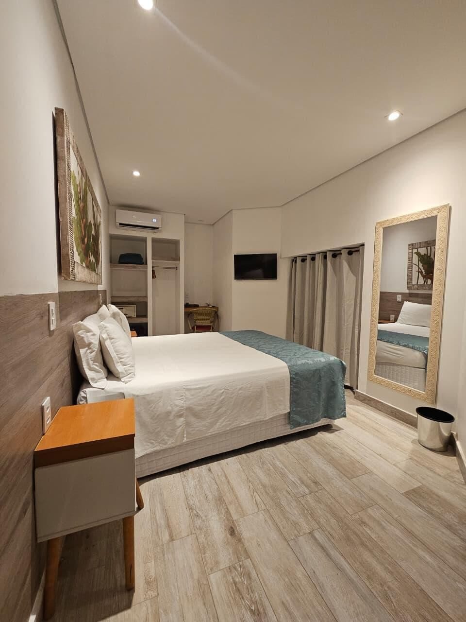 Economy Double or Twin Room | Minibar, in-room safe, soundproofing, bed sheets