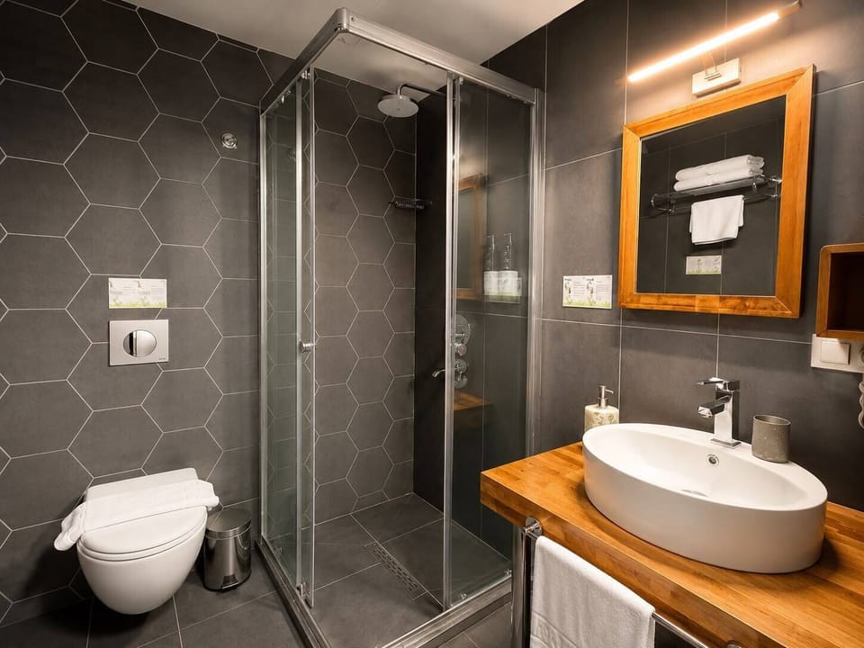 Comfort Double Room, 1 Bedroom, Private Bathroom | Bathroom | Shower, free toiletries, hair dryer, slippers