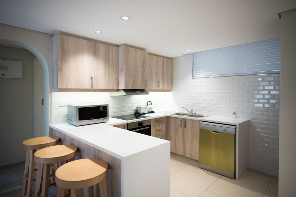 Apartment, 3 Bedrooms, Garden Area | Private kitchen | Full-size fridge, microwave, oven, stovetop