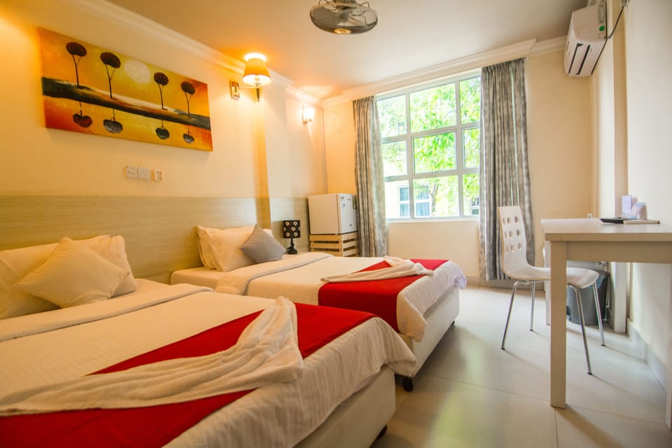 Deluxe Double or Twin Room, 1 Bedroom | Minibar, desk, blackout drapes, soundproofing