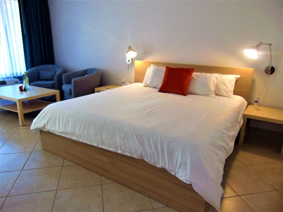 Premium bedding, desk, blackout drapes, iron/ironing board