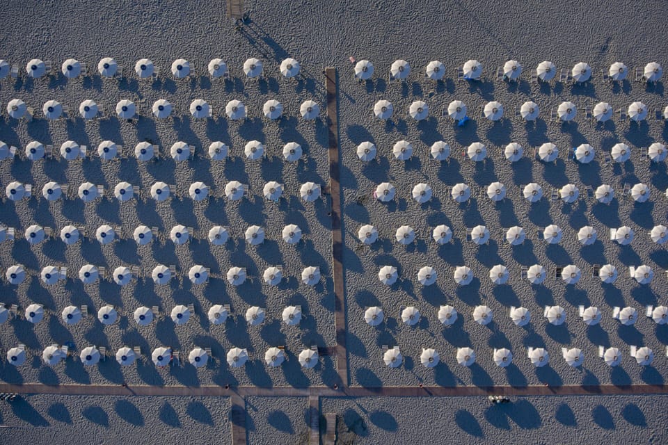 Private beach, white sand, sun loungers, beach umbrellas