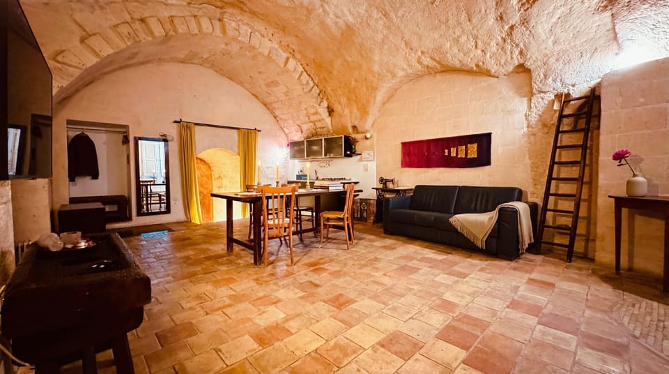Superior Studio Suite | Living area | Flat-screen TV